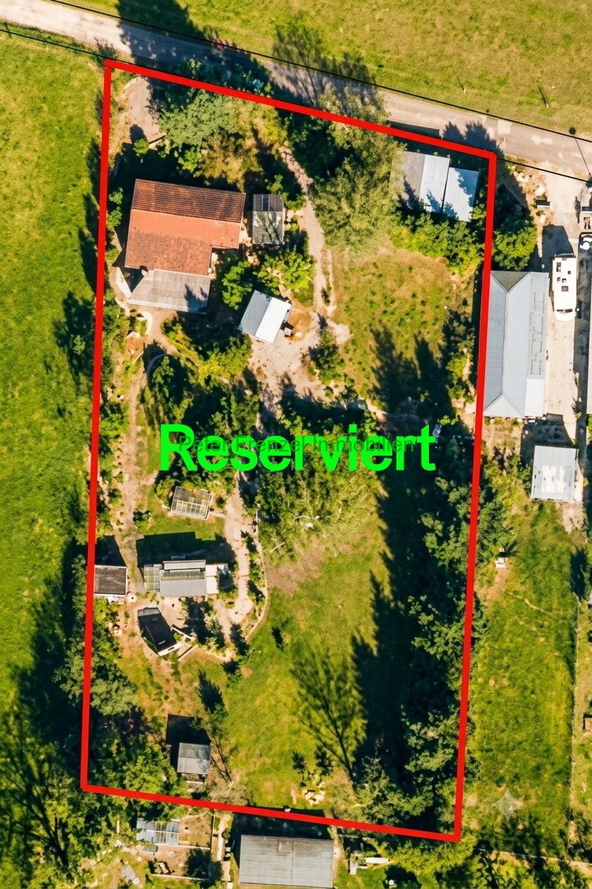 Gepflegter Massiv-Bungalow mit traumhaftem Wintergarten & XL Grundstück 